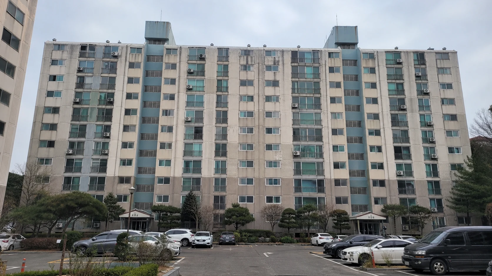Garam Apartments before exterior repainting